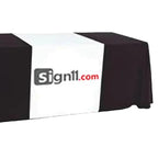 Black and white tablecloth with 'sign11.com' logo on a table runner.